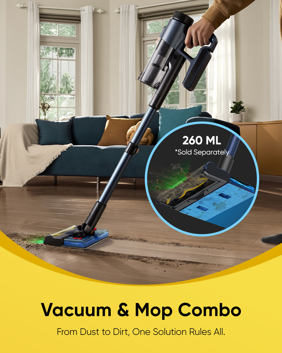 Vacuum and mop combo being used on a wooden floor with a living room in the background.