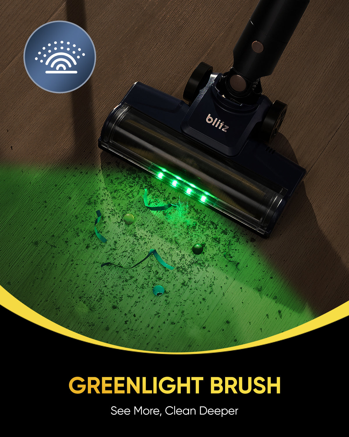 Vacuum brush with green light on a wooden floor, featuring the brand 'blitz'.